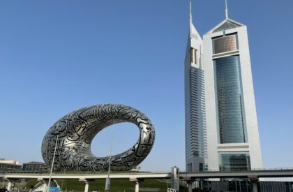 A breathtaking view of a luxury apartment in Dubai with modern interiors and a skyline backdrop.