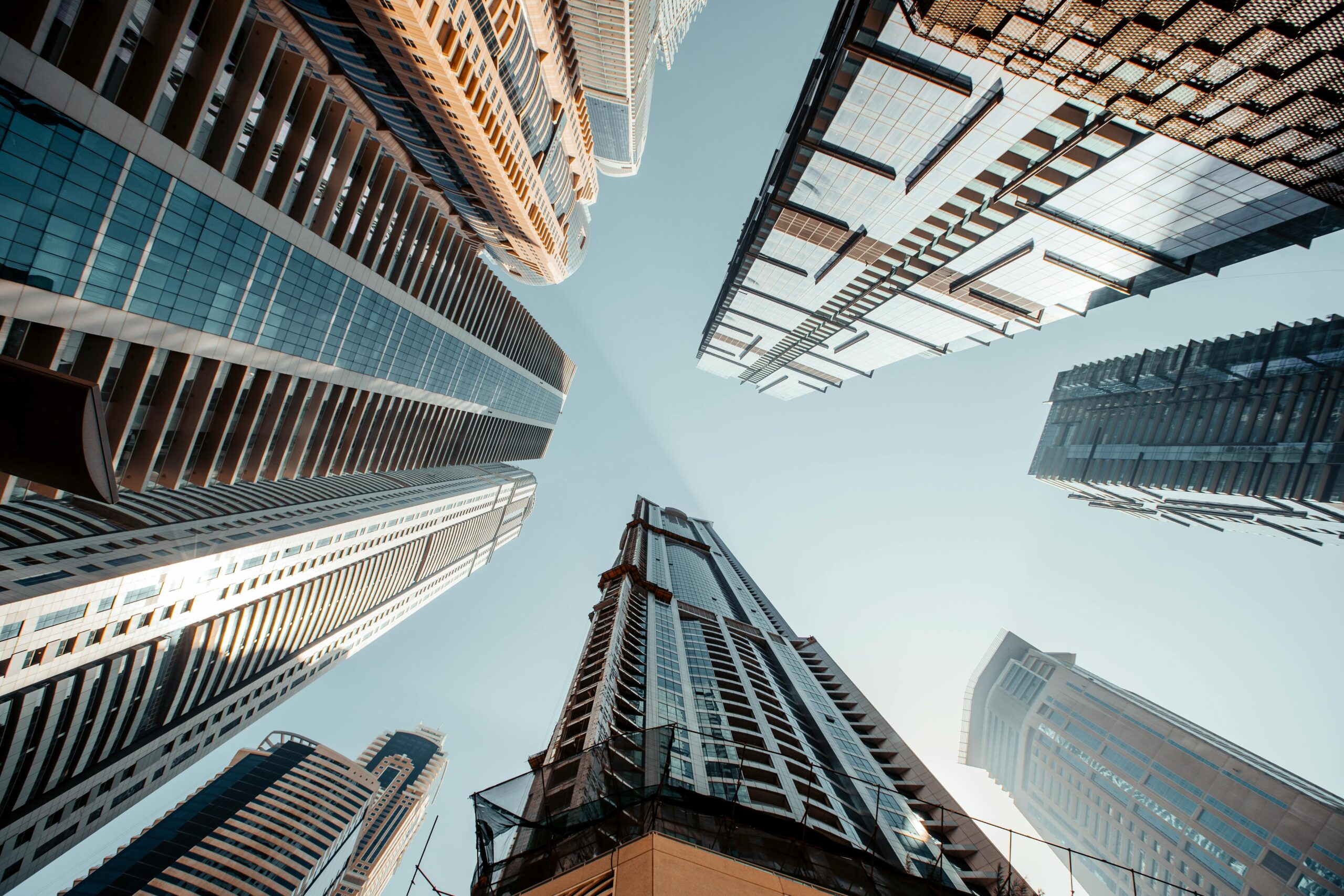 Real estate investors reviewing Dubai property laws to ensure legal compliance and secure investments
