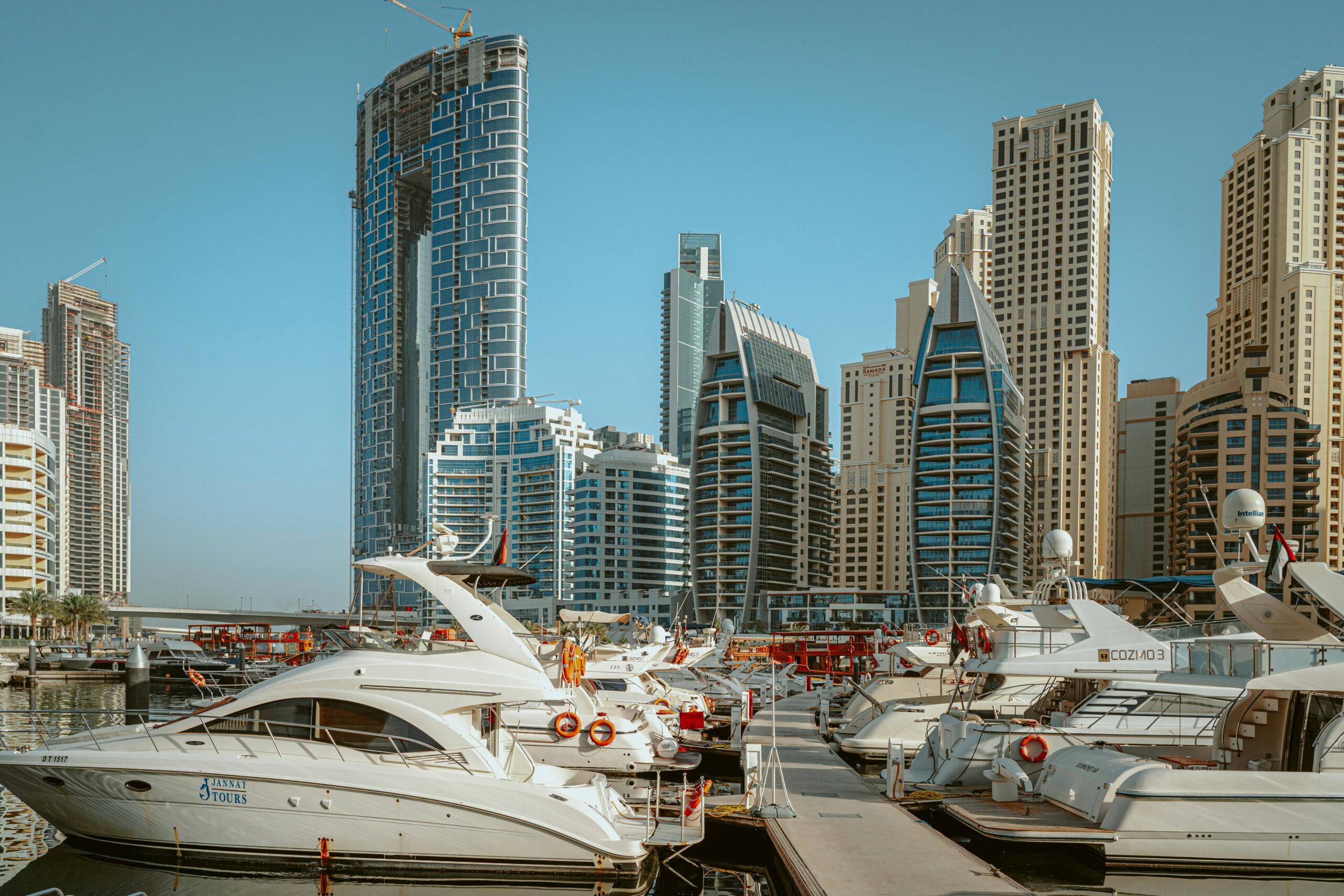 Investor reviewing off-plan property documents and blueprints for investing in Dubai real estate projects