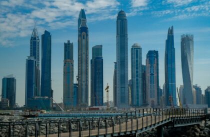 Dubai’s Top 5 Up-and-Coming Investment Areas for 2025 – Realty of Dubai A map of Dubai highlighting the top 5 emerging investment areas for 2025, with visuals of new developments and properties