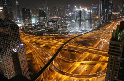 Investor comparing real estate investment opportunities in Dubai with other global markets, focusing on ROI and market trends