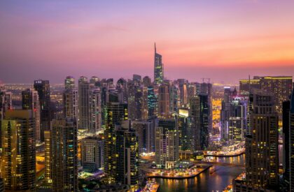Dubai Real Estate Investment: Mistakes to Avoid & Smart Strategies Real estate investor analyzing Dubai property market trends to avoid common investment mistakes