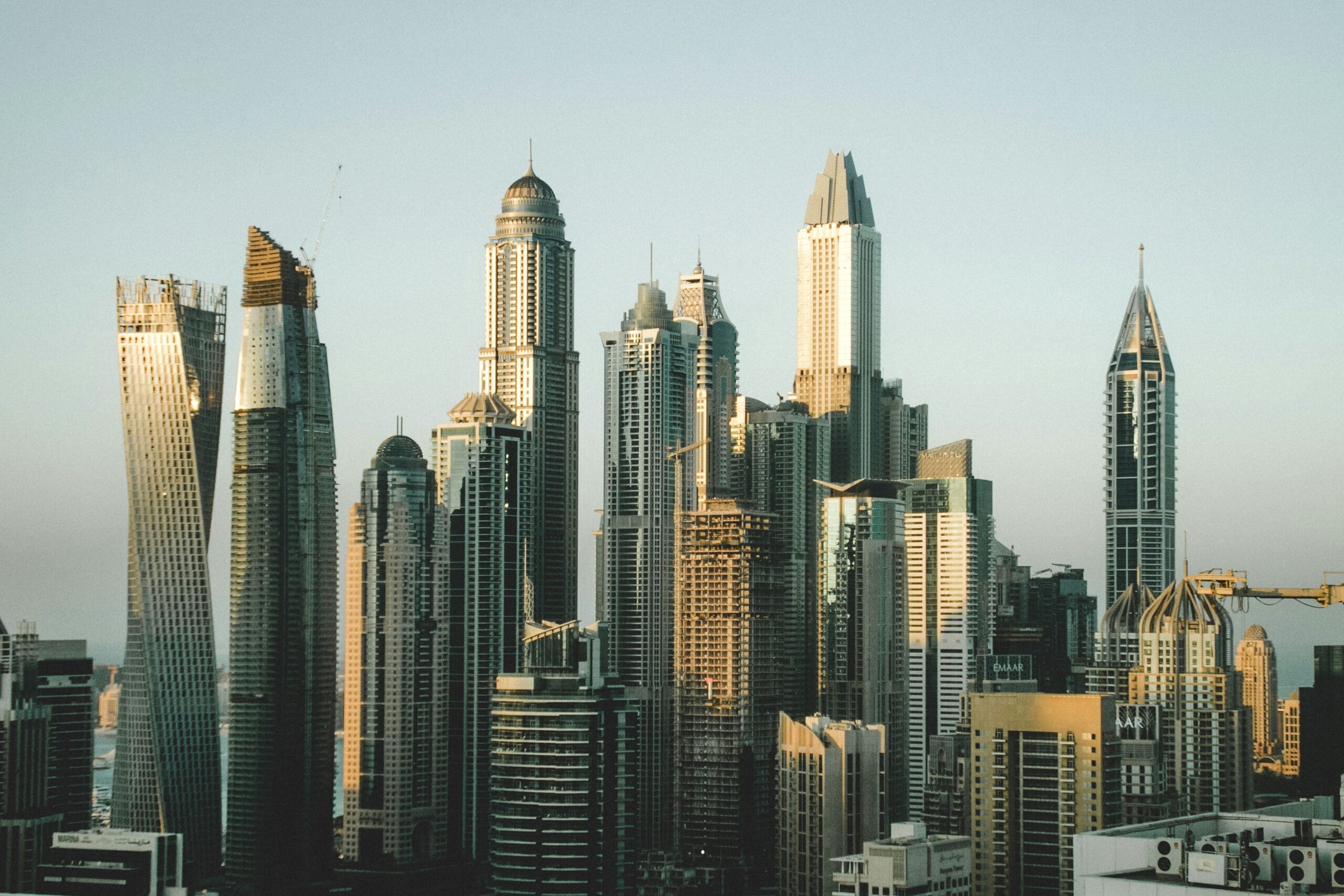 A legal expert explaining property laws in Dubai to an investor, with key legal elements in view