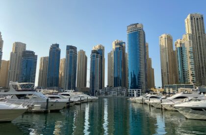 Sell Your Dubai Property for the Best Price – Expert Strategies & Tips property sale strategies with a client in a modern Dubai apartment