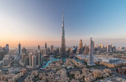 Dubai’s skyline with a focus on luxury properties, overlaying the Golden Visa symbol
