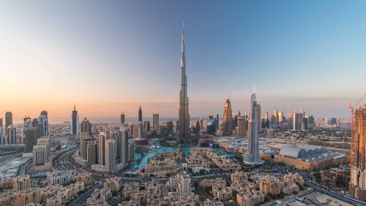 Dubai’s skyline with a focus on luxury properties, overlaying the Golden Visa symbol