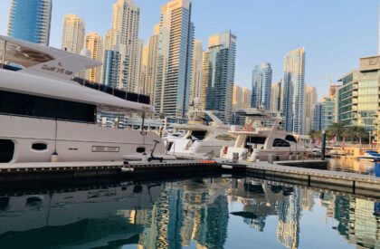 A high-rise residential building in a prime Dubai area, representing strong rental yield potential