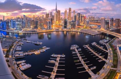Rental Yield in Dubai – Which Areas Offer the Best Returns? A map of Dubai highlighting top areas with high rental yields, featuring high-rise residential buildings and neighborhood landmarks